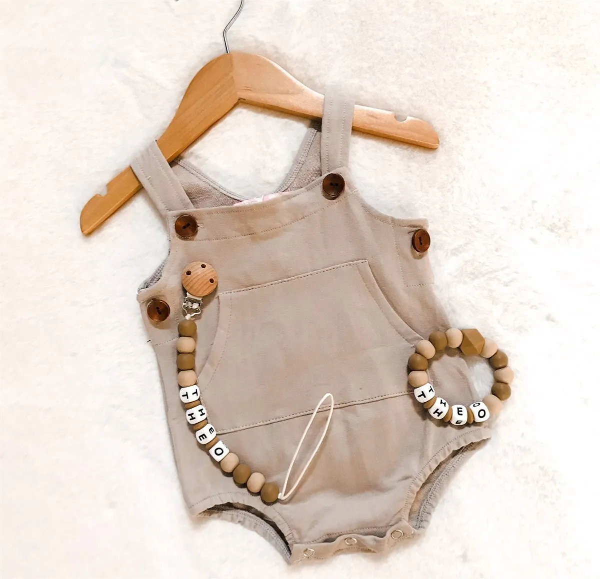 $10.00 EA - 3-6M X 1, 6-12M X 2  - .Pocket & Buttoned Unisex Seasonal Romper - Tan Button