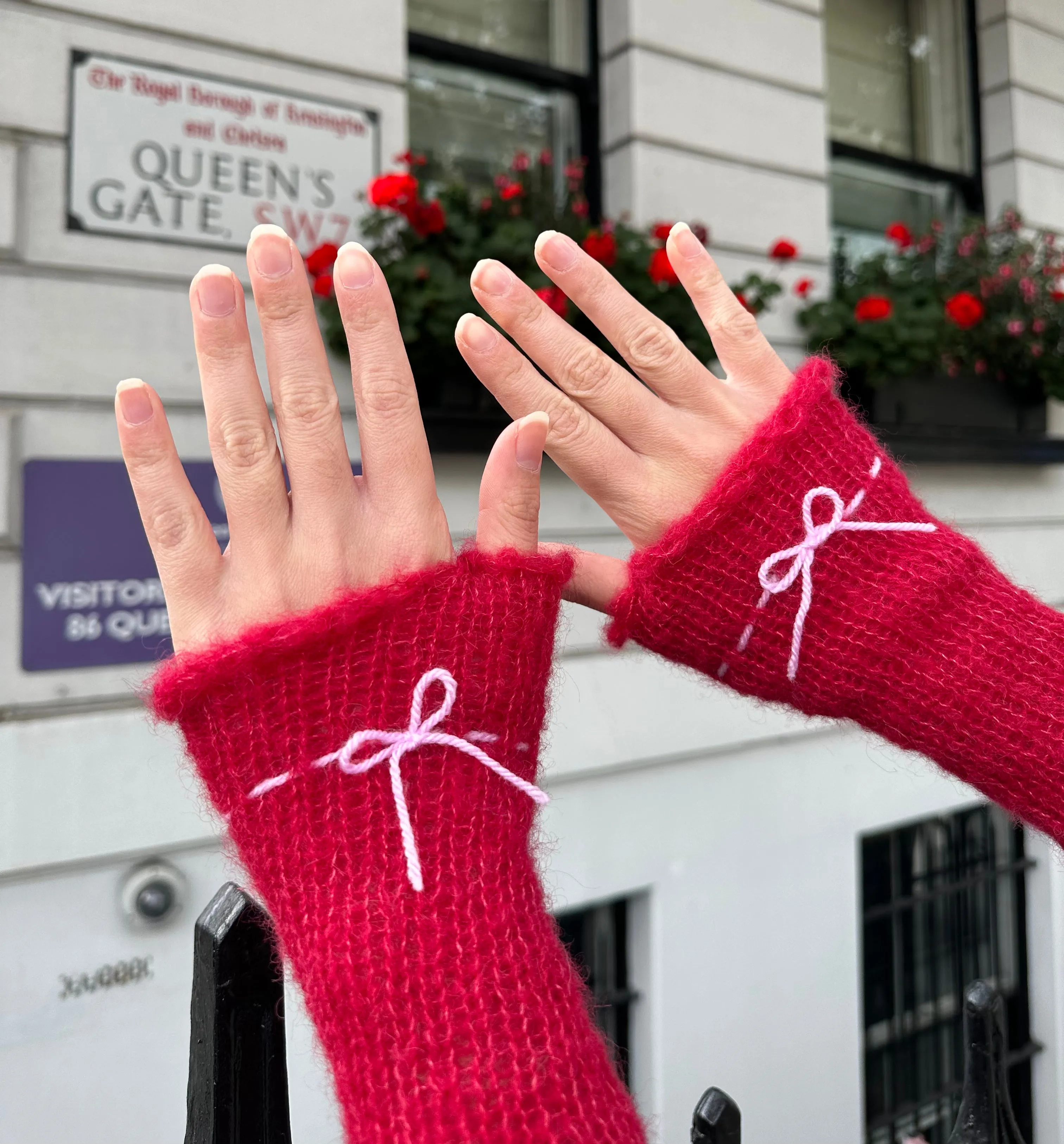 Handmade knitted mohair bow gloves in red & baby pink - with thumb hole